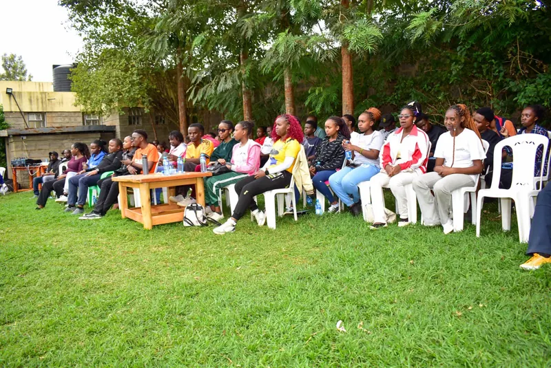Students listening at an outdoor session