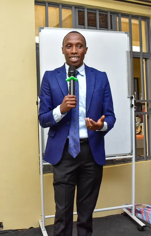 Simon Mugetha presenting in a classroom